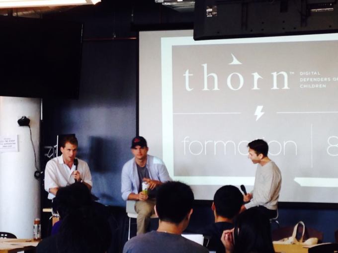 Joe Lonsdale (Formation 8) and Ashton Kutcher (Thorn) are interviewed by Pierre Arys (Formation 8) in front of the 25 teams at the anti-child-sex-trafficking hackathon at Twilio in San Francisco on August 23.