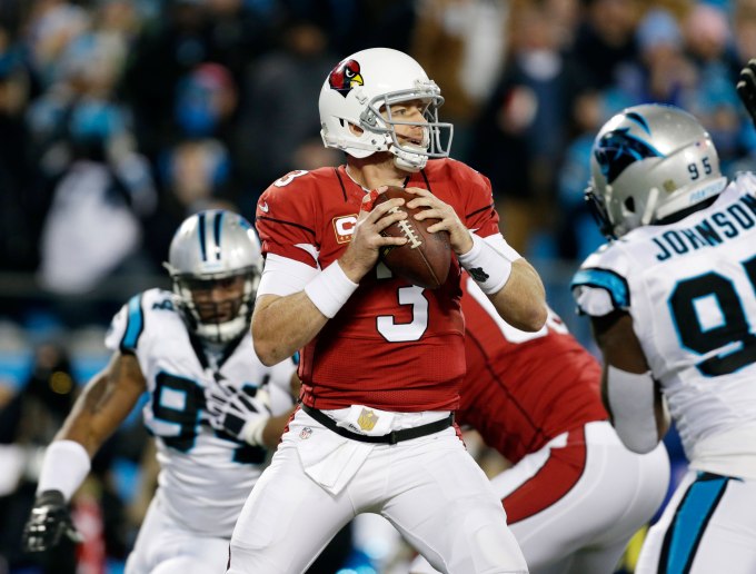 Arizona Cardinals' Carson Palmer drops back during the first half the NFL football NFC Championship game against the Carolina Panthers, Sunday, Jan. 24, 2016, in Charlotte, N.C. (AP Photo/Bob Leverone)