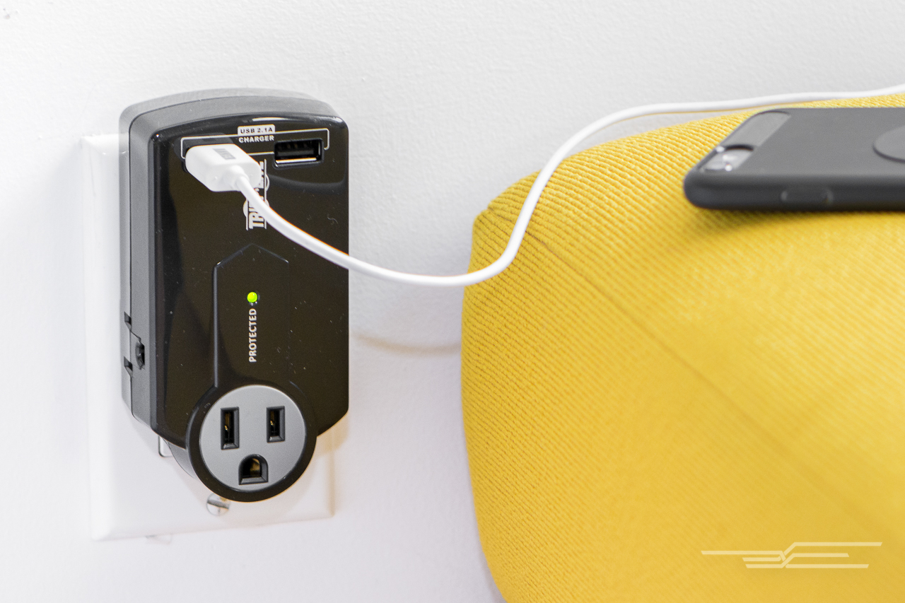 The Accell Home or Away protector rotates, folds up, and gives you (and other coffee shop warriors) more plugs. Photo: Michael Hession
