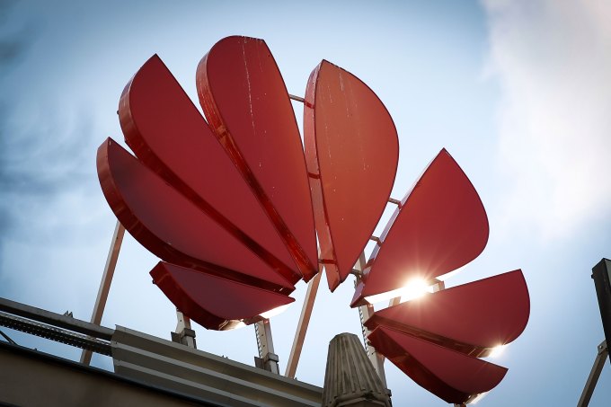 The Huawei logo is seen in the center of Warsaw, Poland